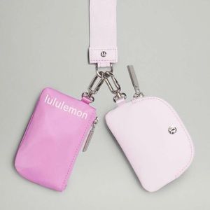 Lululemon Dual Pouch Wristlet in Dahlia Mauve / Meadowsweet Pink